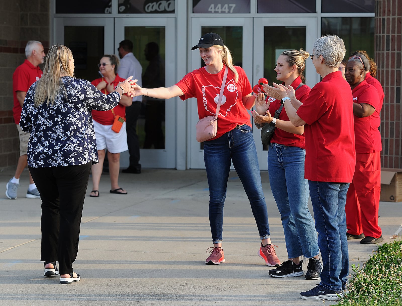 The Dayton teachers union members clap in first year teachers Thursday, Aug. 3, 2023 at Thurgood Marshall High School. MARSHALL GORBY\STAFF