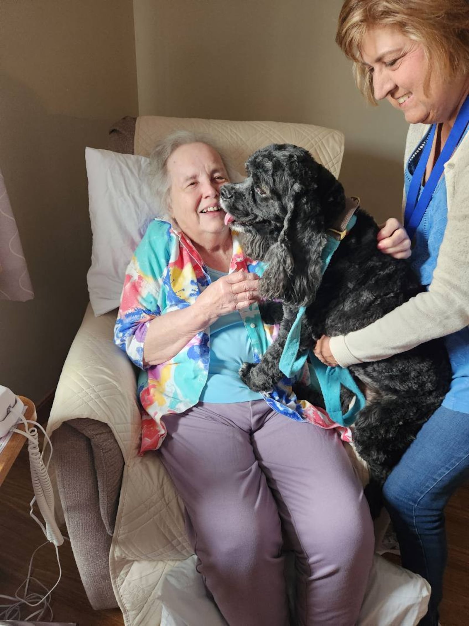 Therapy animal CoCo brings smiles to the faces of residents at Austin Trace Health and Rehabilitation. CONTRIBUTED