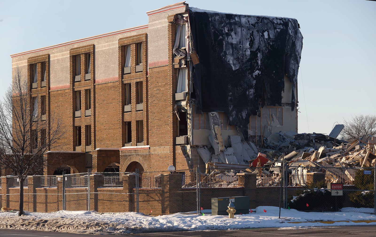 Work continues Thursday, Jan. 16, 2025 on the demolition of the Ramada in downtown Xenia. MARSHALL GORBY\STAFF