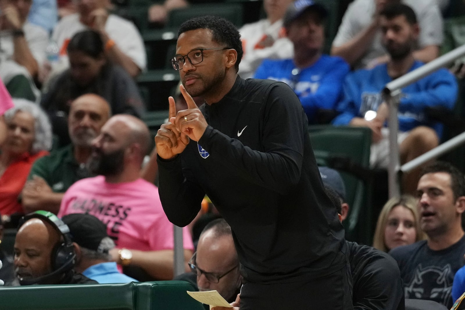 Duke associate head coach Jai Lucas gestures during the second half of an NCAA college basketball game against Miami, Tuesday, Feb. 25, 2025, in Coral Gables, Fla. (AP Photo/Marta Lavandier)