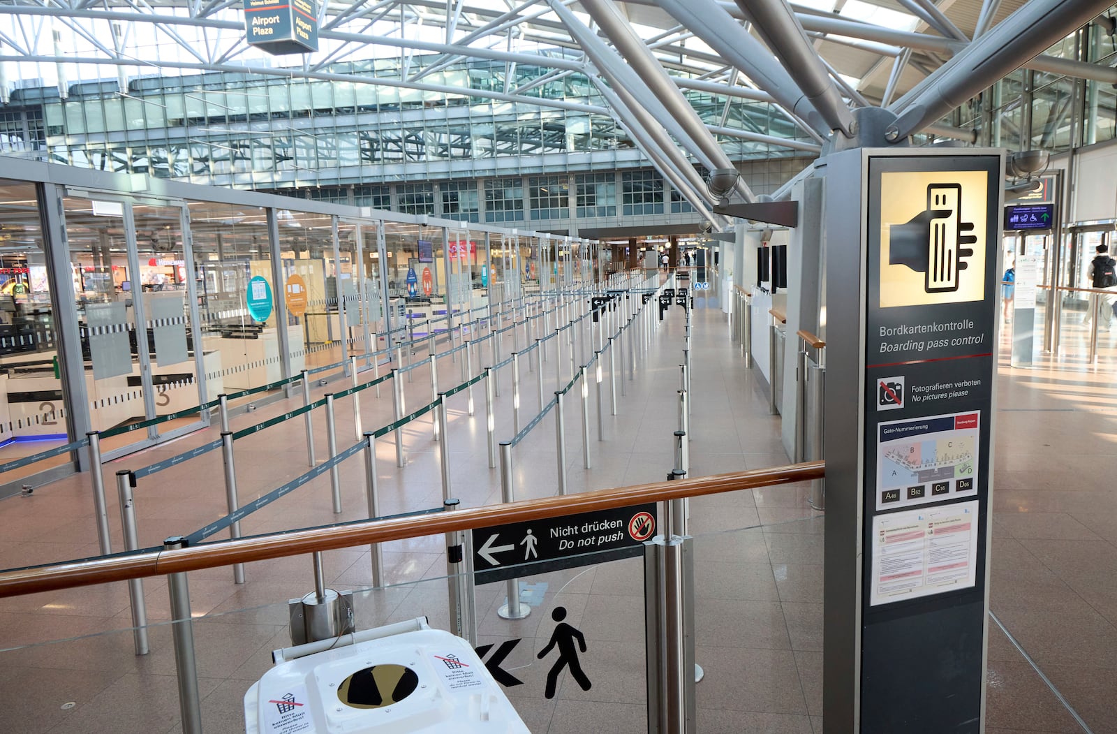 An area in front of the security checkpoints is empty at Hamburg Airport, Germany Sunday, March 9, 2025. (Georg Wendt/dpa via AP)