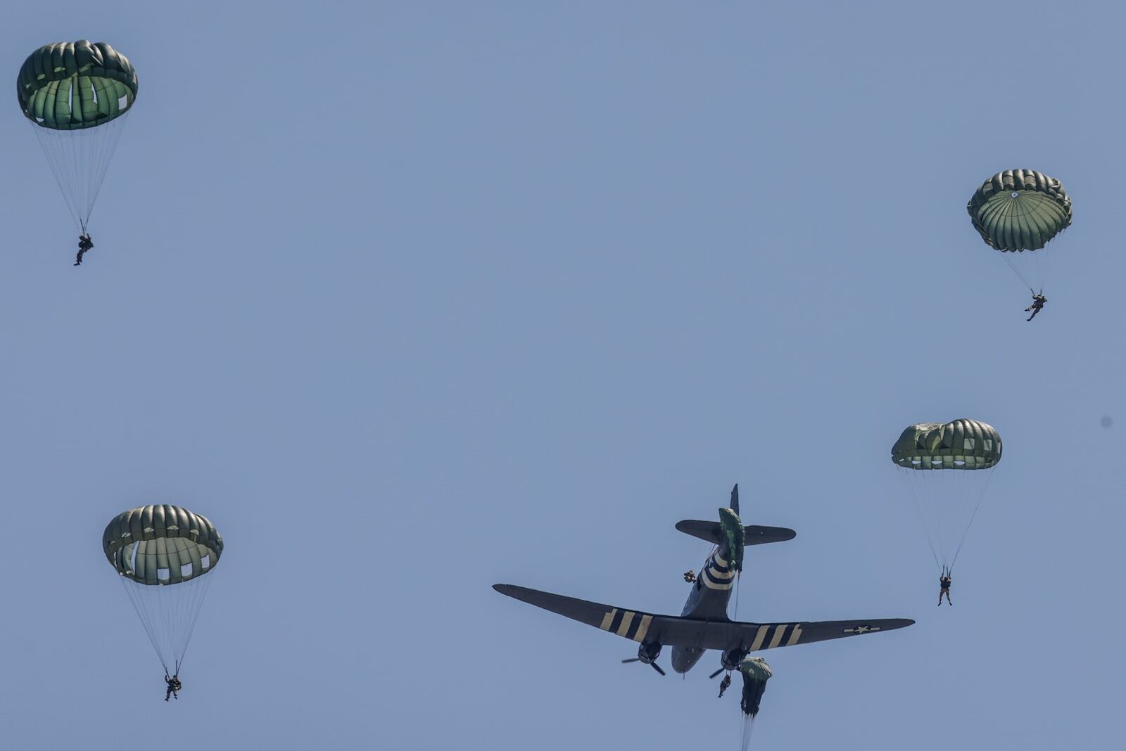 Two WWII C-47 aircraft and around 30 paratroopers visited the National Museum of the United States Air Force Wednesday April 27, 2022. After landing, the public was permitted to check out the historic aircraft close-up. JIM NOELKER/STAFF