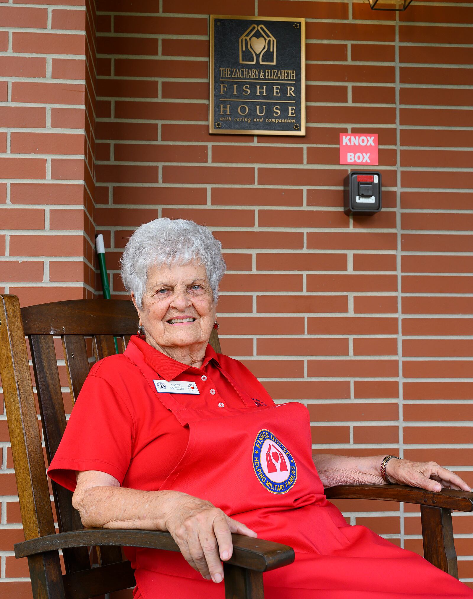 Carol McClure, pictured July 16 outside the Fisher House at Wright-Patterson Air Force Base, was honored as the Air Force Fisher House Volunteer of the Year for 2021. She has volunteered at the facility for 29 years. U.S. Air Force photo by R.J. Oriez