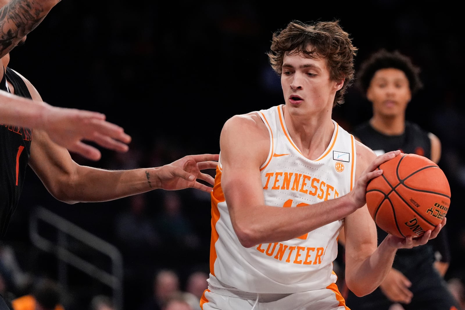 Tennessee forward Cade Phillips dribbles during the first half of an NCAA college basketball game against Miami, Tuesday, Dec. 10, 2024, in New York. (AP Photo/Julia Demaree Nikhinson)