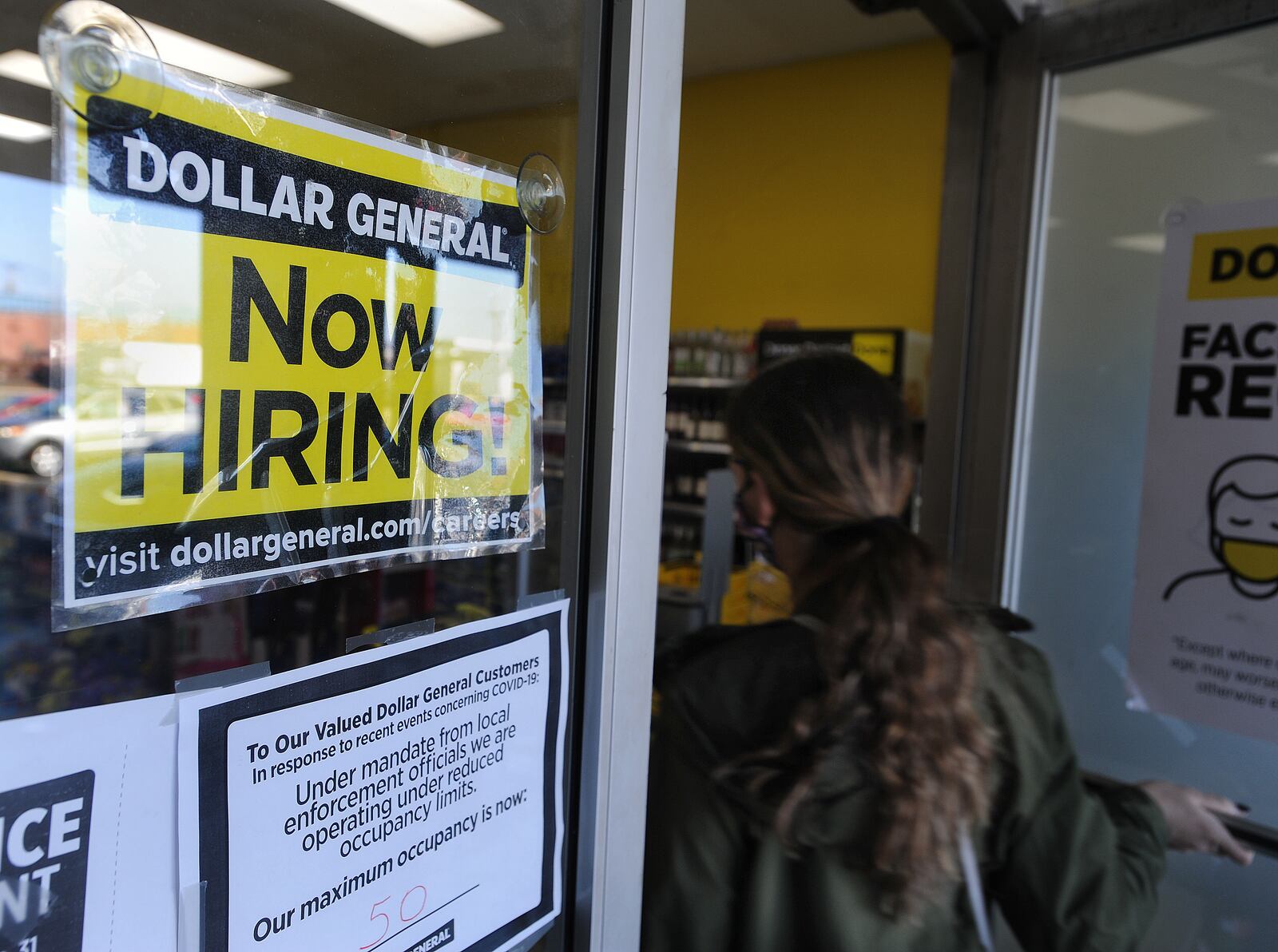 Dollar General is hiring at the Woodlane Plaza in Dayton. MARSHALL GORBY\STAFF