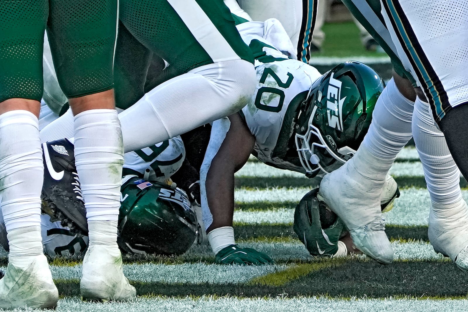 New York Jets running back Breece Hall (20) scores on a 1-yard touchdown run against the Jacksonville Jaguars during the second half of an NFL football game Sunday, Dec. 15, 2024, in Jacksonville, Fla. (AP Photo/John Raoux)