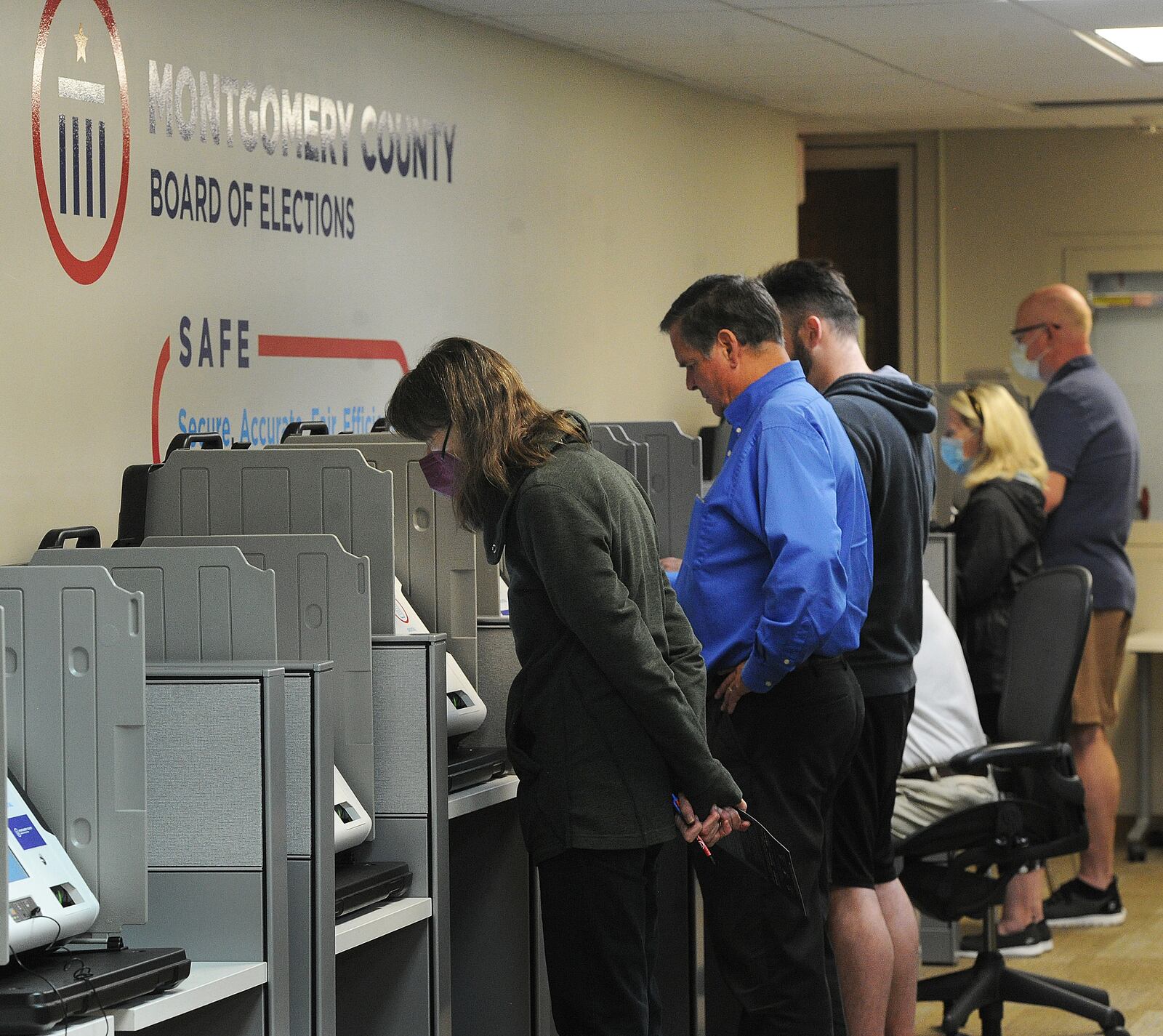 Voters at the Montgomery County Board of Elections Wednesday Oct. 12, 2022. Early voting started Wednesday in Ohio. Election officials expect a large turnout of early voters this year. MARSHALL GORBY\STAFF