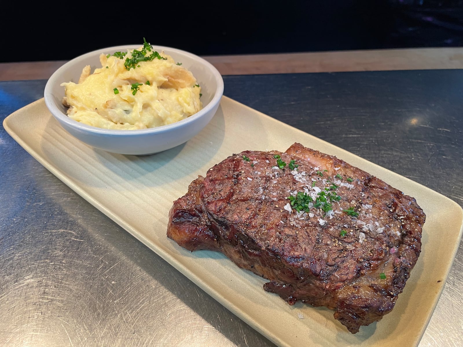 Corner Kitchen is located at 613 E. Fifth St. in Dayton’s Oregon District. Pictured is a steak and mashed potatoes. NATALIE JONES/STAFF