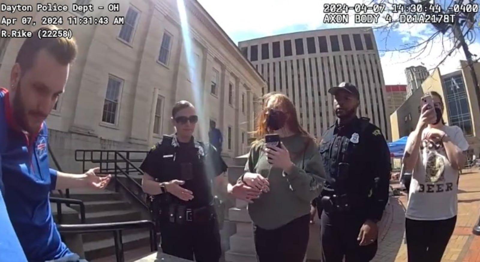 Dayton police arrested a man at Courthouse Square in downtown Dayton on April 7, 2024, for handing out food without a permit. Body camera footage captured the incident. CONTRIBUTED