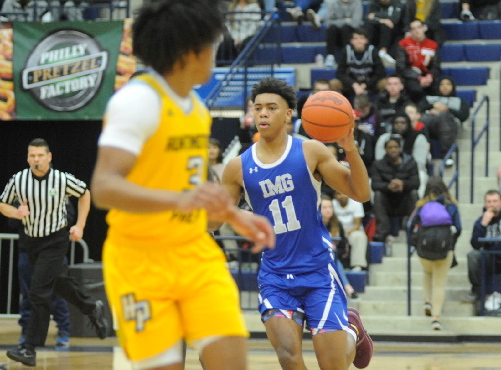 Jaden Springer (with ball) had a game-high 27 points. IMG Academy (Fla.) defeated Huntington Prep (W.Va.) 83-75 in Flyin’ Game 2 on Friday night. MARC PENDLETON / STAFF