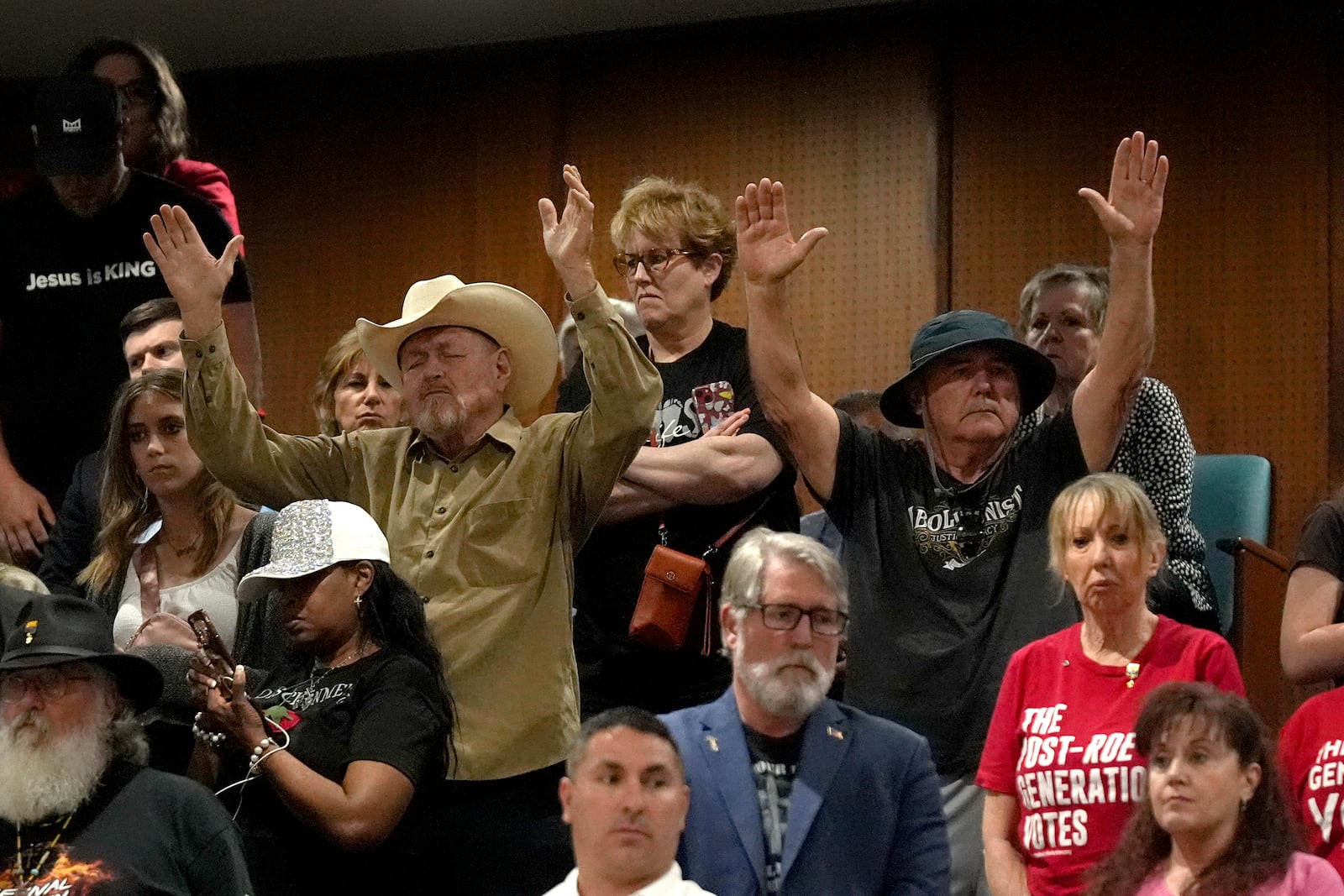 FILE - Predominantly anti-abortion supporters stand in the Arizona House gallery during the vote on the proposed repeal of Arizona's near-total ban on abortions prior to winning approval from the state House Wednesday, April 24, 2024, in Phoenix. (AP Photo/Ross D. Franklin, File)