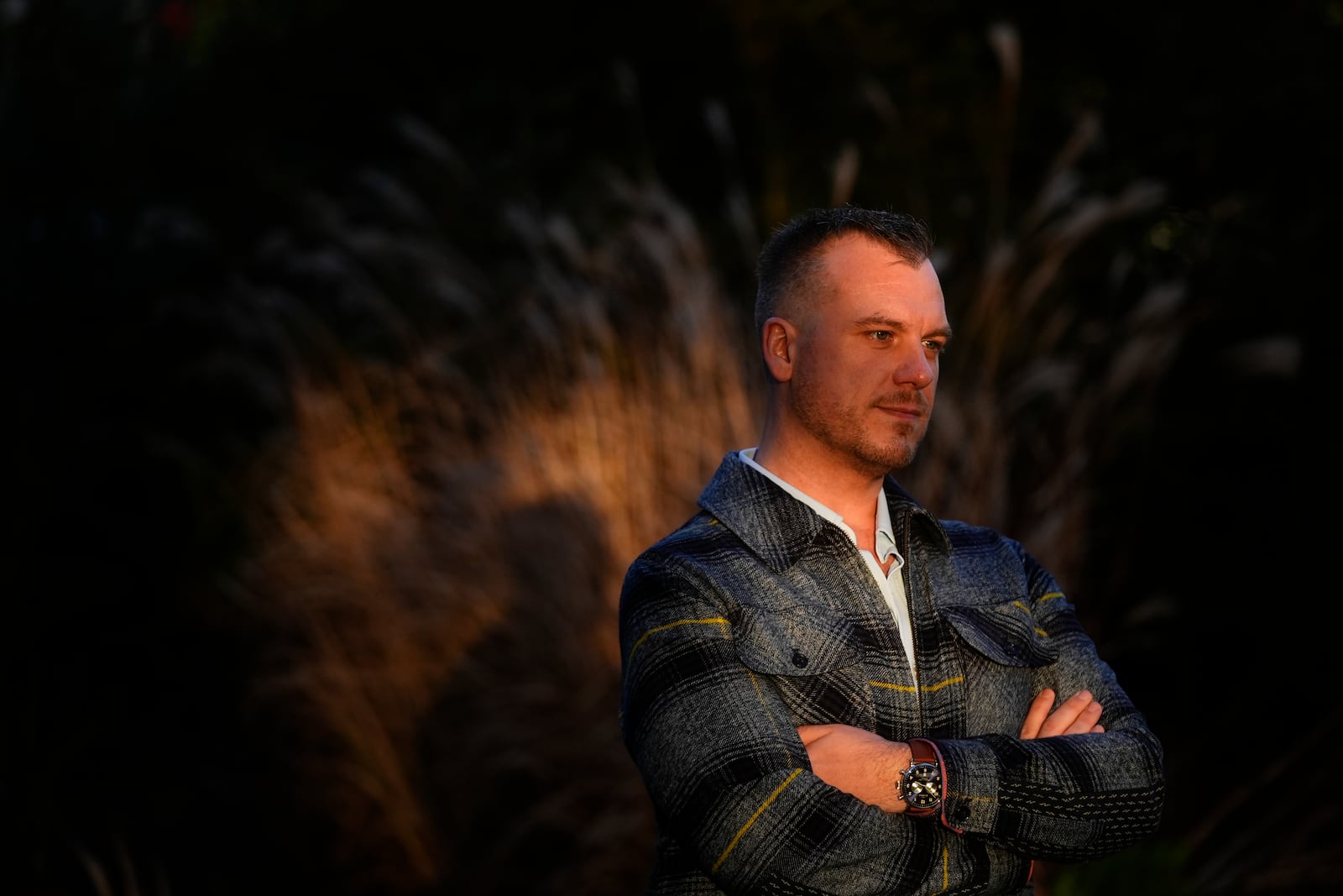 Recreational rugby player Sean McDowell, whose SafeSport case investigator Jason Krasley was fired after being arrested for stealing drug money in his previous job as a police officer, poses for a portrait Wednesday, Dec. 18, 2024, in Seattle. (AP Photo/Lindsey Wasson)