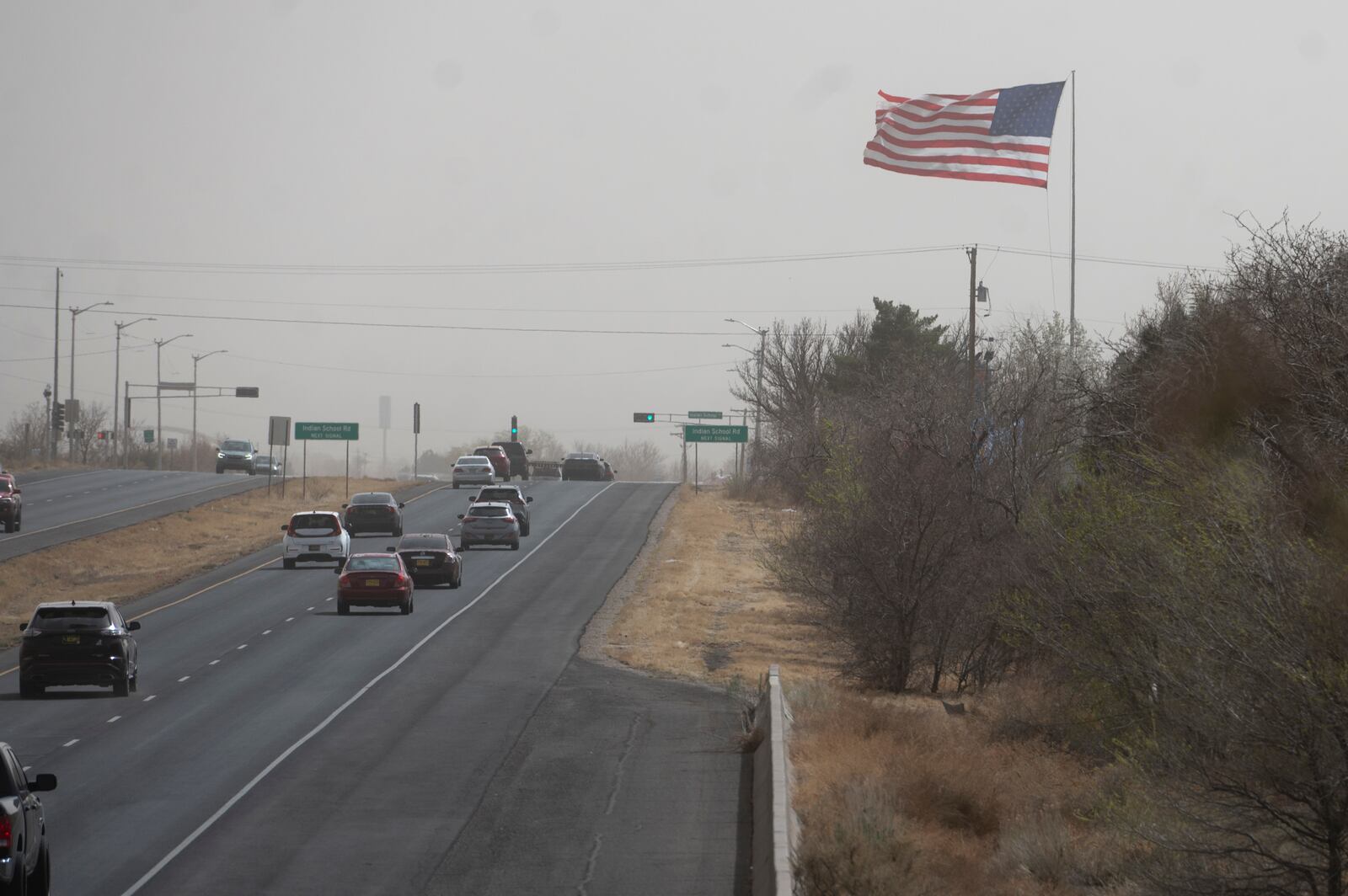 Winds whip across Tramway Boulevard NE in Albuquerque, N.M., Tuesday, March 18, 2025. (Jon Austria/The Albuquerque Journal via AP)