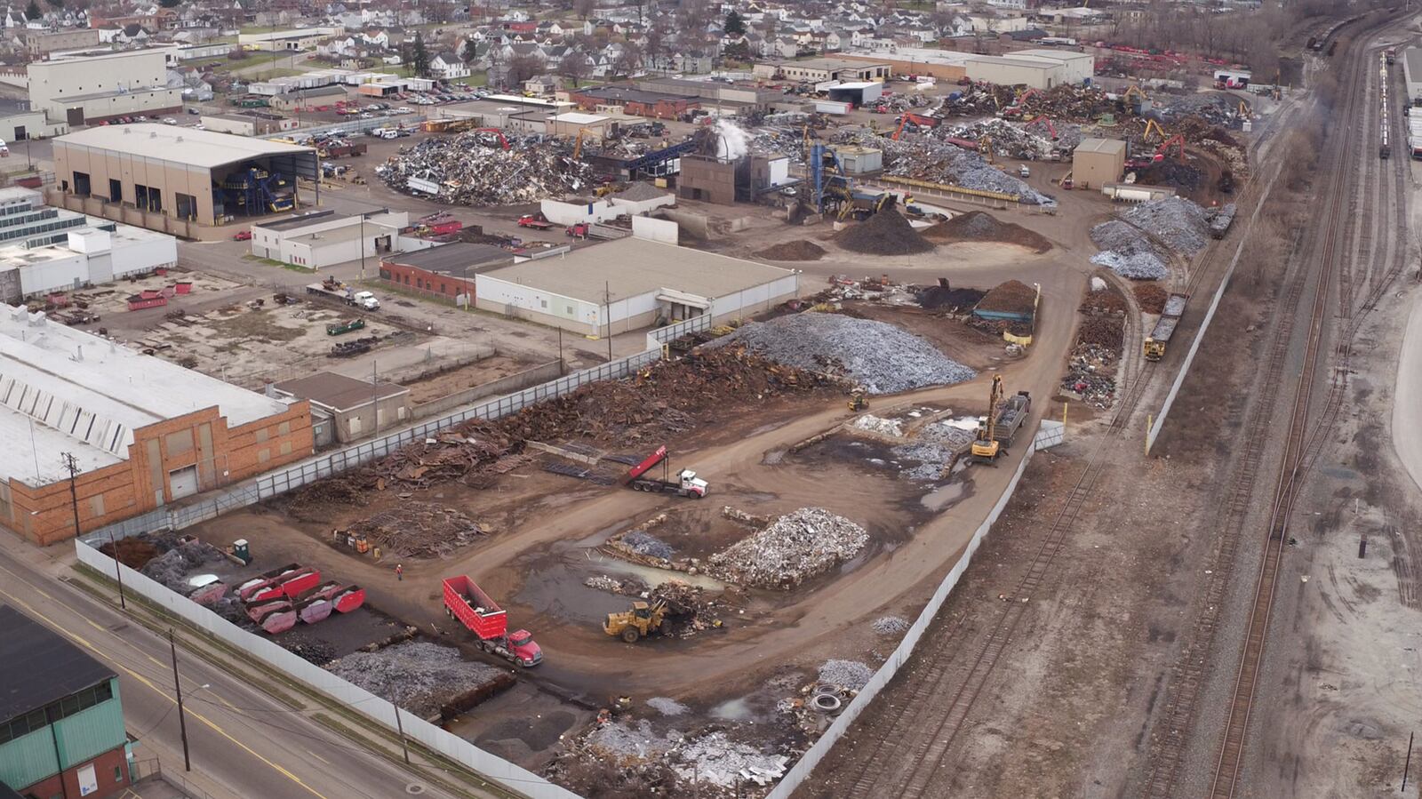 Trucks and cranes are constantly on the move at Franklin Iron and Metal as scrap is transported, sorted and transported again.   TY GREENLEES / STAFF