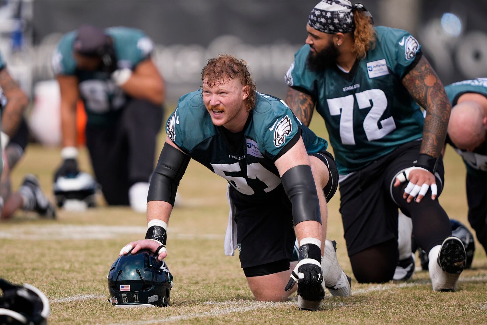 Philadelphia Eagles center Cam Jurgens (51) warms up during an NFL football practice Friday, Feb. 7, 2025, in New Orleans, ahead of Super Bowl 59 against the Kansas City Chiefs. (AP Photo/Gerald Herbert)