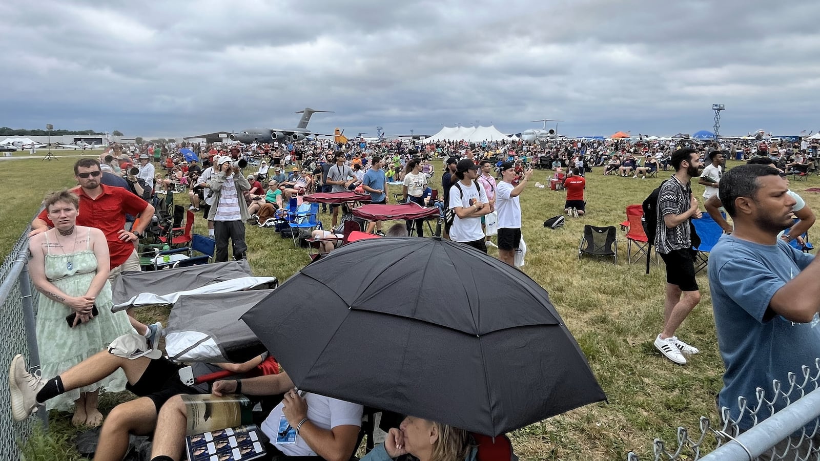 Crowds gathered under cloudy skies for the Dayton Air Show on Sunday, June 23, 2024. CORNELIUS FROLIK / STAFF