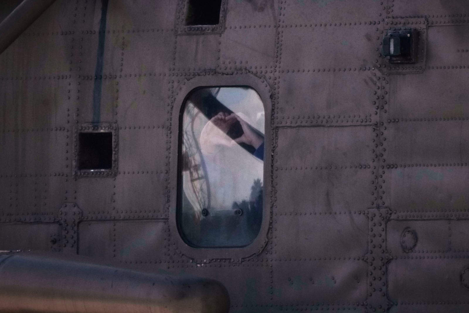 One of the abducted Israeli female soldiers gesture from inside the military helicopter as they arrive to the Beilinson hospital in Petah Tikva, near Tel Aviv, Israel, Saturday, Jan. 25, 2025. (Photo/Leo Correa)