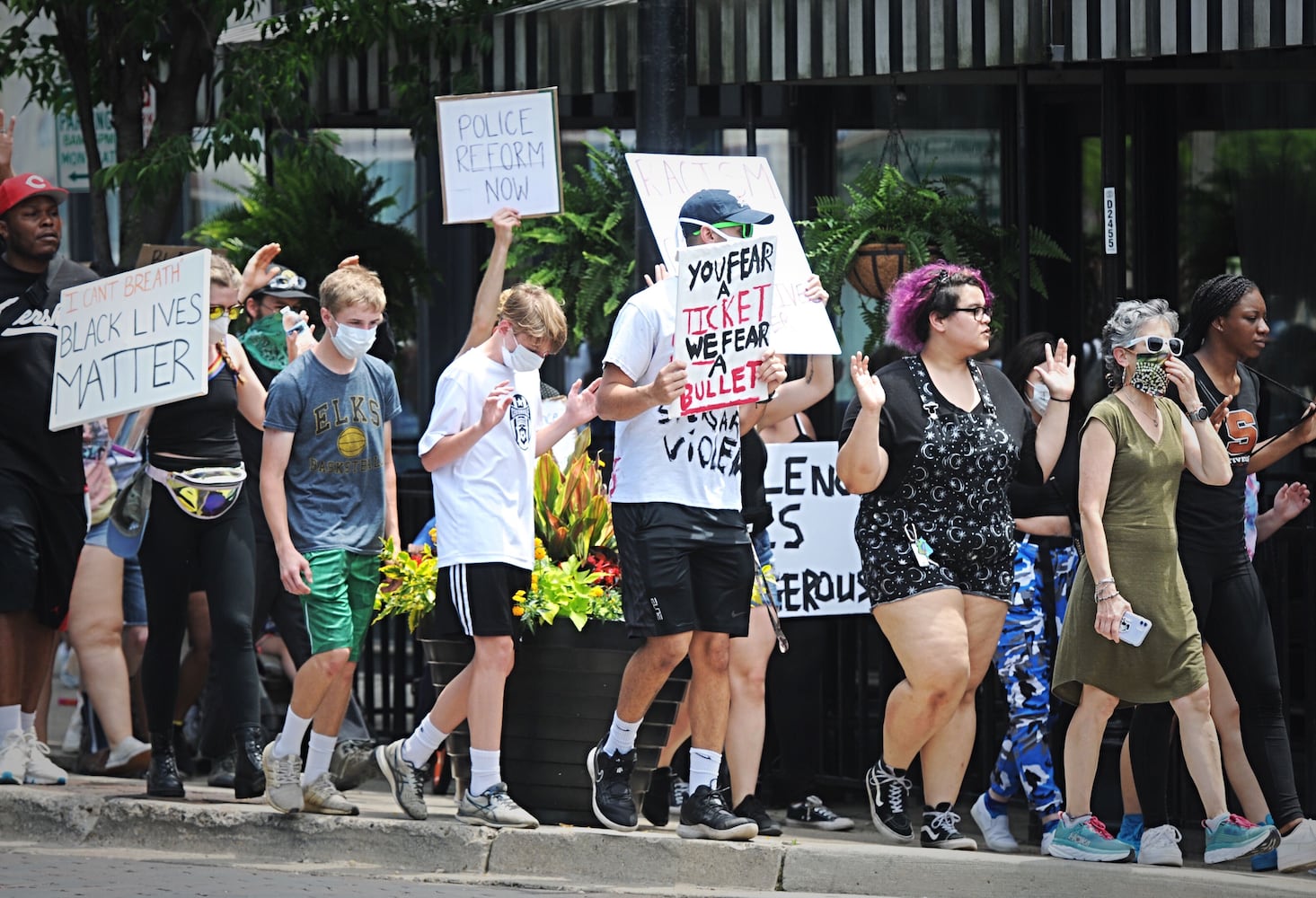 PHOTOS: Protestors march through the Oregon District Thursday