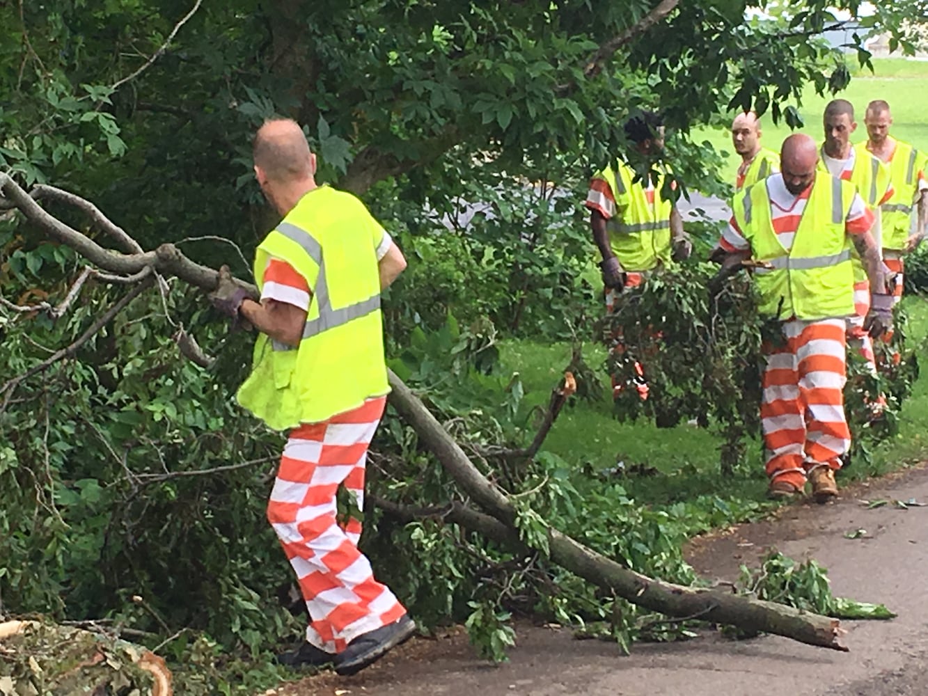 PHOTOS: Tornado-damaged communities dig out, clean up