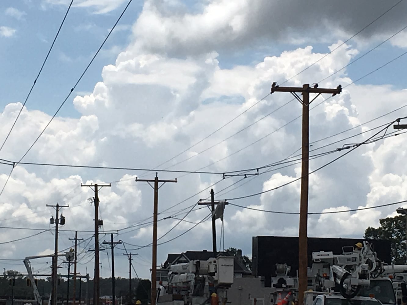 PHOTOS: Tornado-damaged communities dig out, clean up