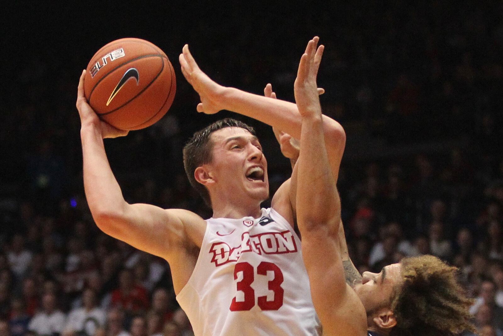 Dayton's Ryan Mikesell shoots against Richmond on Thursday, Jan. 19, 2017, at UD Arena. David Jablonski/Staff