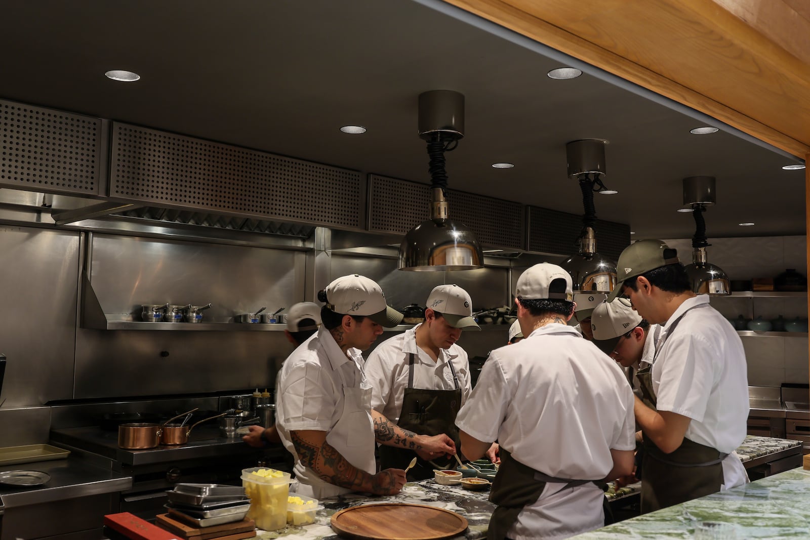 Quintonil's team of chefs test sauces for the menu at the restaurant in Mexico City, Friday, Feb. 28, 2025. (AP Photo/Ginnette Riquelme)