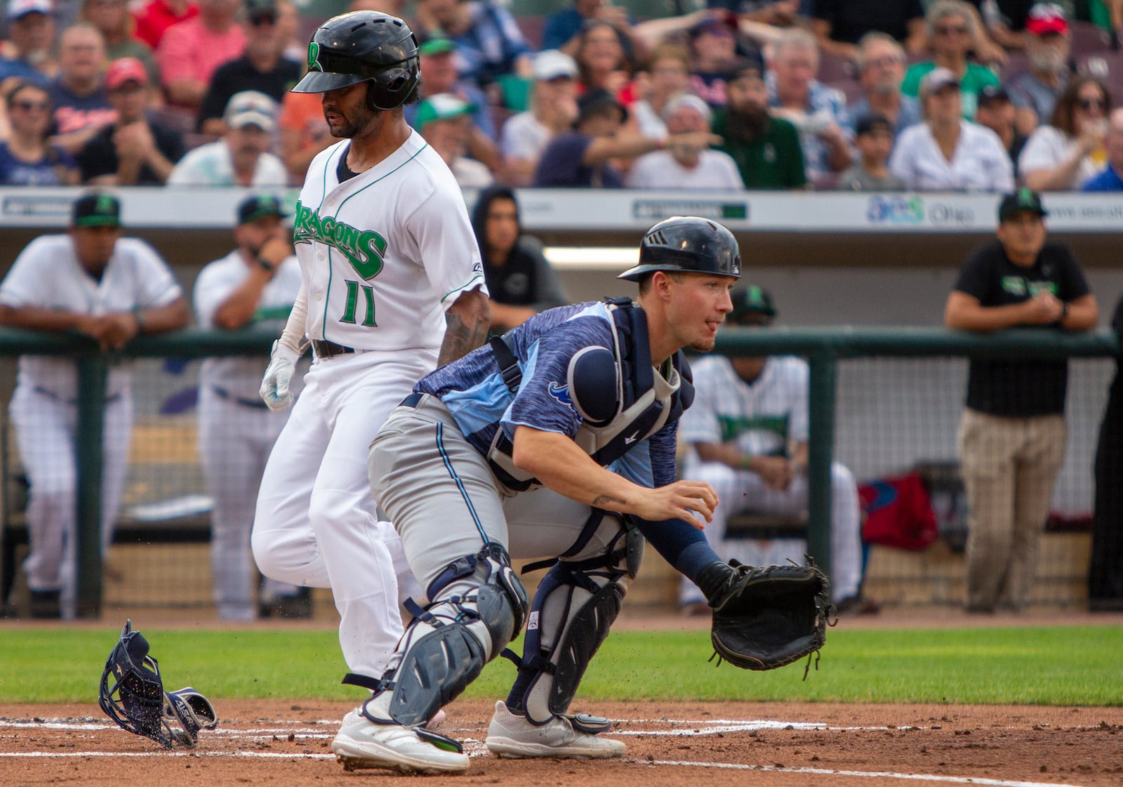 Dayton's Quin Cotton scores on a single by Victor Ruiz for a 3-0 Dragons' lead in the first inning Wednesday night. Cotton started the scoring with a two-run double. Jeff Gilbert/CONTRIBUTED