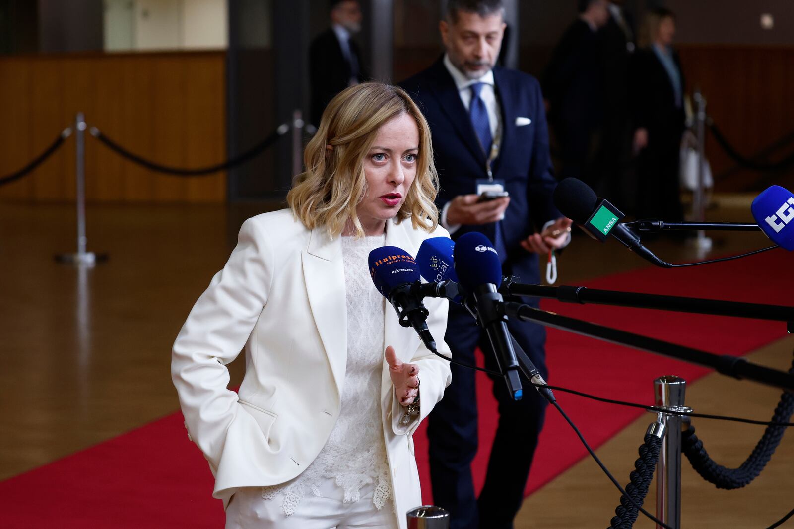 Italy's Prime Minister Giorgia Meloni speaks with the media during an EU Summit at the European Council building in Brussels, Thursday, March 6, 2025. (AP Photo/Omar Havana)