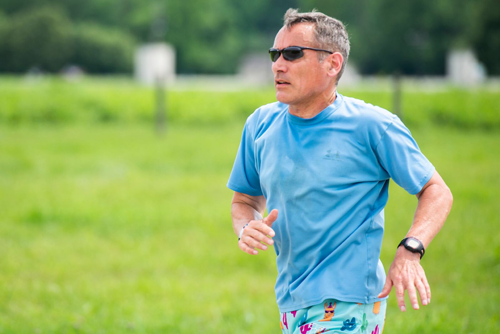 William Neitzke, 88th Air Base Wing director of safety, takes part in the Pride Month 5K on June 24, which led runners through Huffman Prairie at Wright-Patterson Air Force Base. U.S. AIR FORCE PHOTO/WESLEY FARNSWORTH