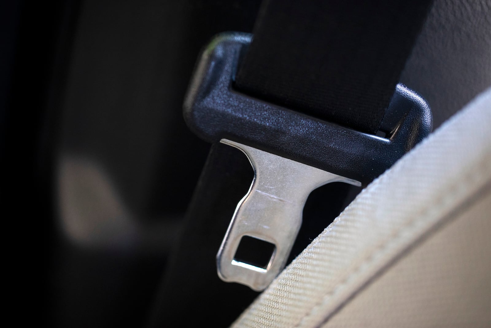 FILE - A seat belt for the right front passenger seat is shown in a vehicle on Aug. 21, 2023. (AP Photo/Jenny Kane, file)