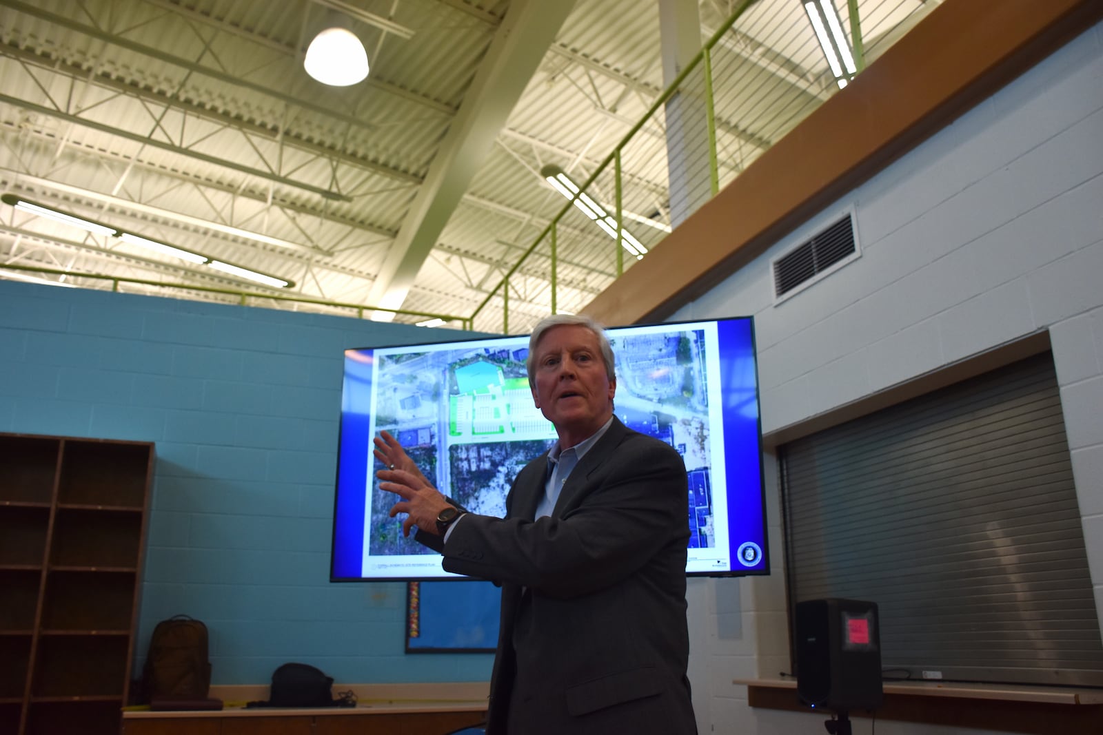 Richard Willis, senior project manager with App Architecture, discusses a proposed new Dayton Police Department station in West Dayton. CORNELIUS FROLIK / STAFF