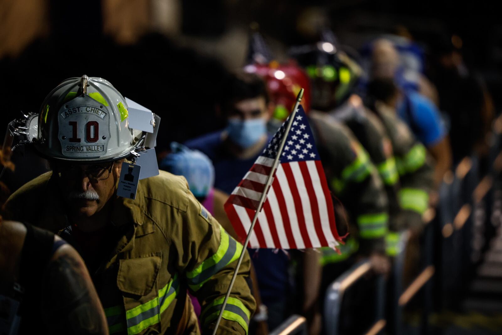 Spring Valley Twp. firefighter, Gary Zehring climbs steps at UD Arena in honor of those killed in the 911 attacks on the twentieth anniversary.  JIM NOELKER/STAFF