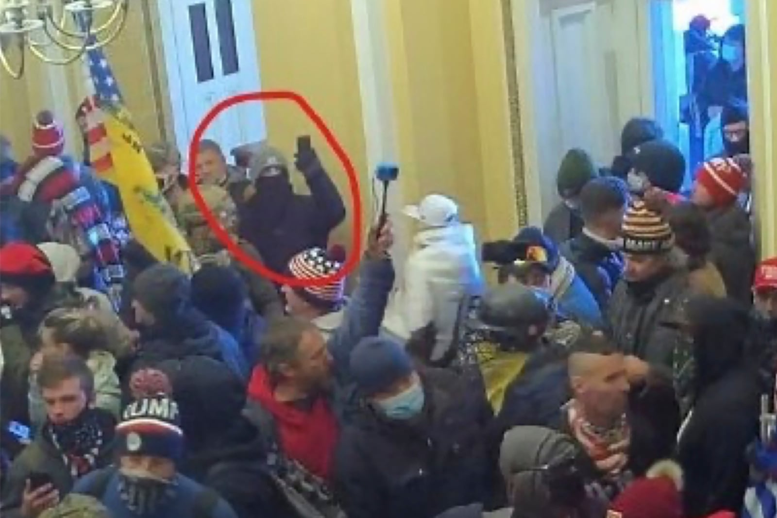 This image provided by District of Columbia Attorney's Office obtained from the U.S. Capitol Police shows Matthew Huttle inside the Capitol building on Jan. 6, 2021 in Washington. (Attorney's Office, District of Columbia via AP)