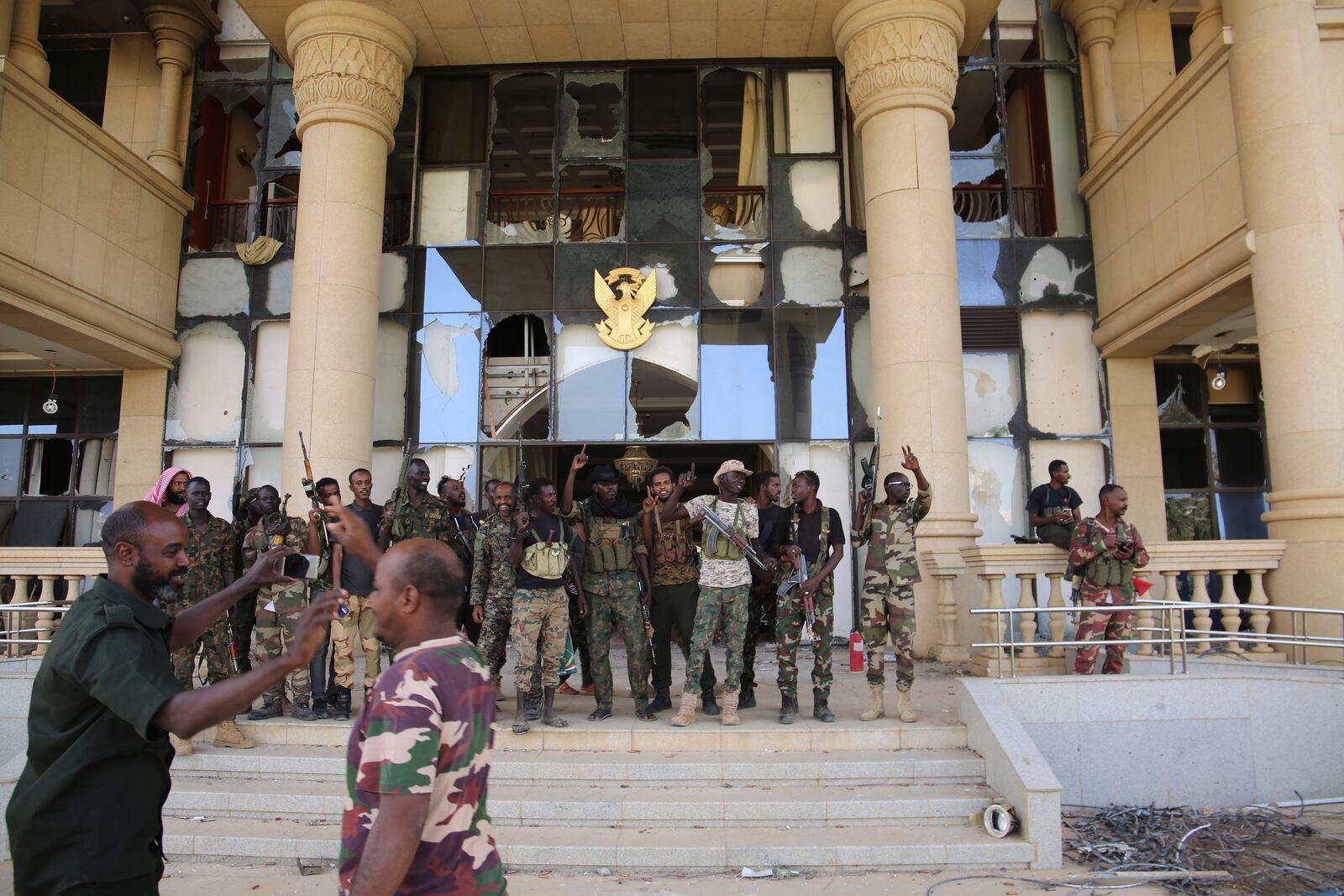 Sudan's army soldiers celebrate after they took the Republican Palace in Khartoum, Sudan, Friday, March 21, 2025. (AP Photo)