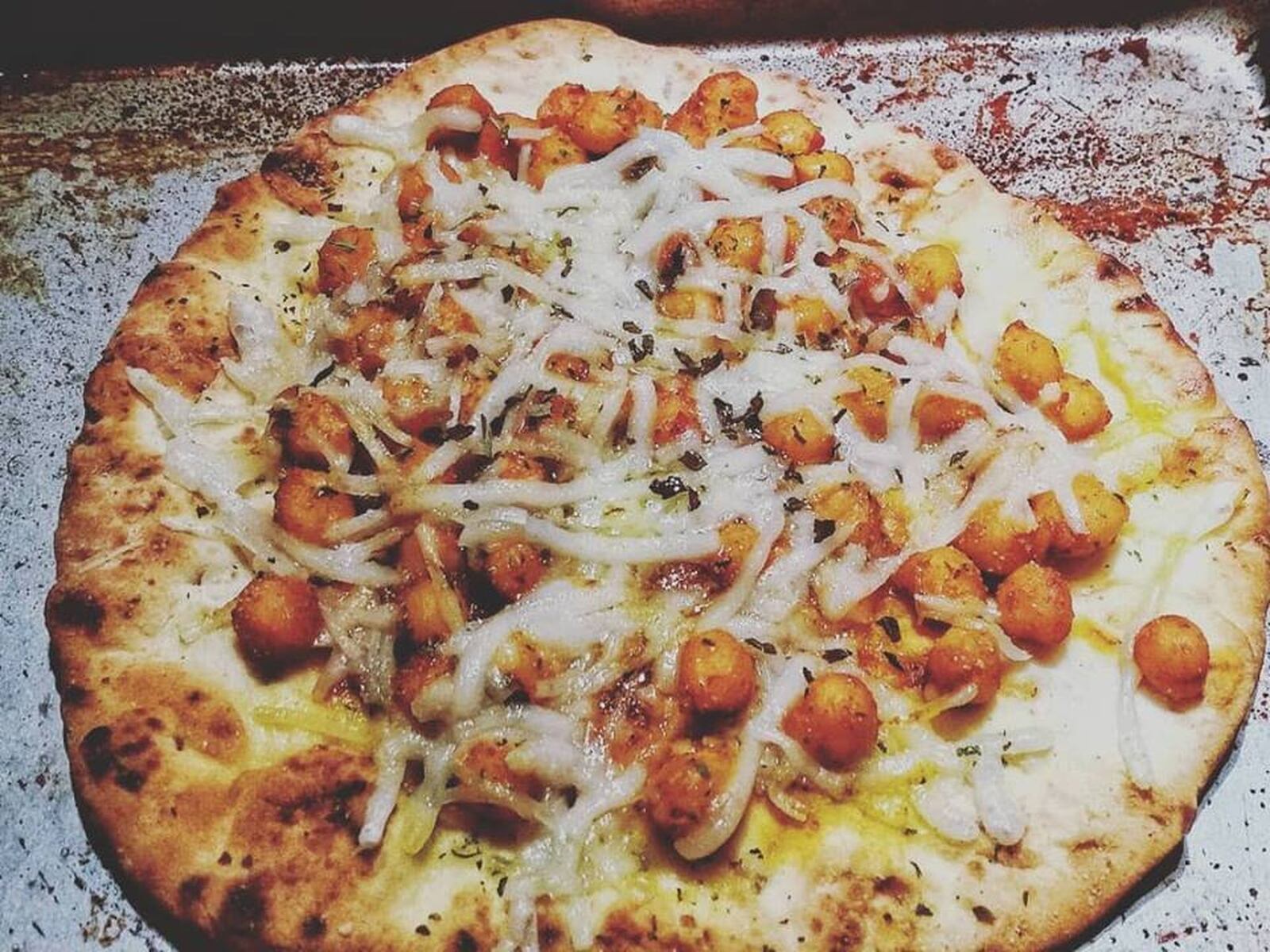 A vegan pizza with barbecue chickpeas and vegan cheese, by Chef Da'Ves Malone of Sprouting Dreams LLC. CONTRIBUTED