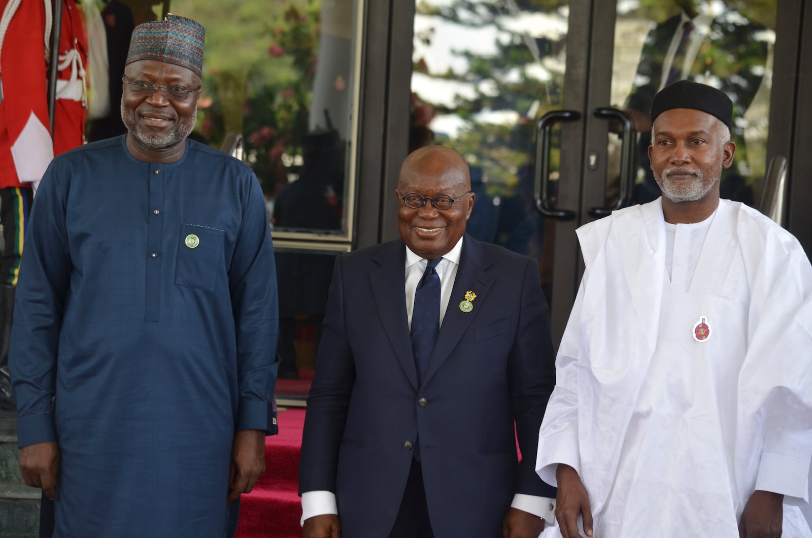 Omar Touray, president of the ECOWAS Commission, left, Ghana's President, Nana Akufo Addo, center and Nigeria Minister of Foreign Affairs, Yusuf Tuggar pose for a photo, prior to the start of the ECOWAS meeting in Abuja, Nigeria, Sunday, Dec 15, 2024. (AP Photo/Olamikan Gbemiga)