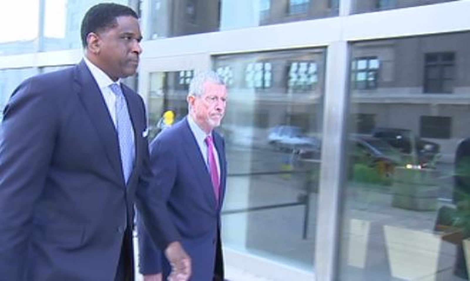 Former Dayton City Commissioner Joey D. Williams on Friday, Sept. 27, 2019, pleaded guilty and was convicted of one count of corruptly soliciting a bribe, a federal felony. Williams (left) is with his attorney, Patrick John Hanley. CHUCK HAMLIN/STAFF