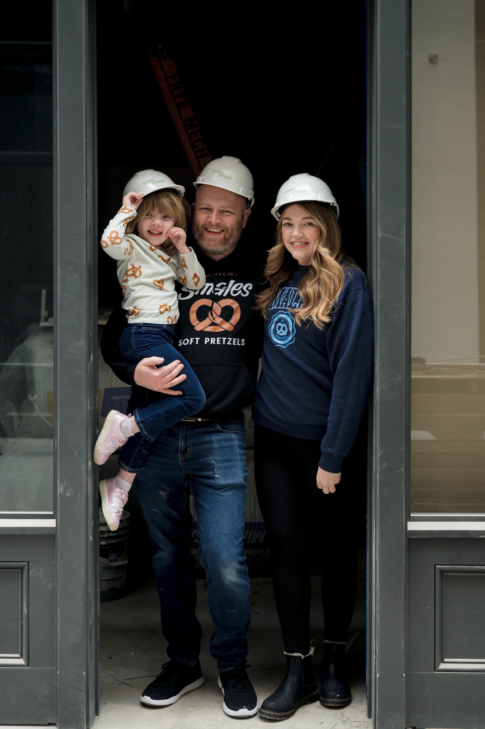 Smales Pretzel Bakery is opening a second location inside the Dayton Arcade's North Arcade. Pictured is owner Emma Smales with her husband, Joe Middlesworth and daughter, Avenelle Middlesworth (Knack Video + Photo).