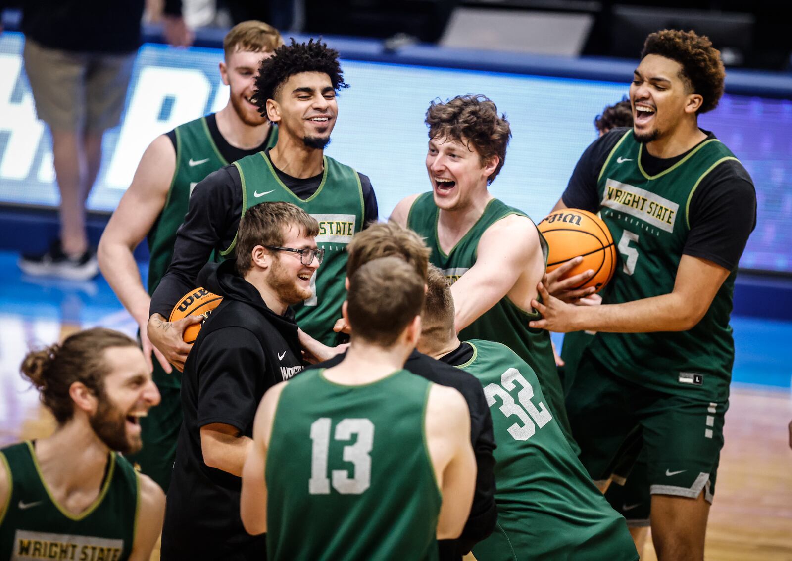 The Wright State basketball team enjoys practice Tuesday before the First Four at the Dayton Arena.