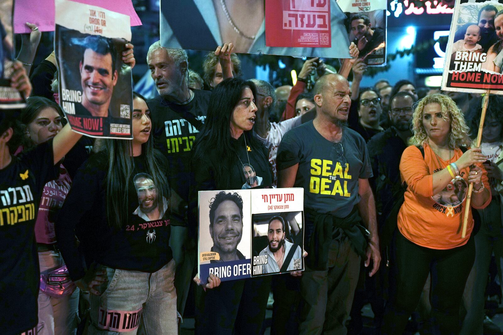 FILE - Einav Zangauker, center, mother of Israeli hostage Matan Zangauker, takes part in a protest in Tel Aviv, Israel, Dec. 7, 2024, following the release of a Hamas video of Matan making a plea for his own release. (AP Photo/Mahmoud Illean, File)