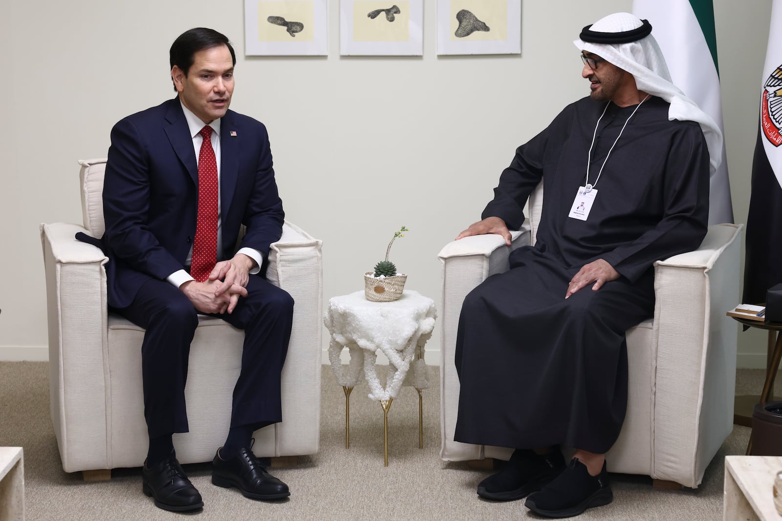 U.S. Secretary of State Marco Rubio, left, meets United Arab Emirates President Sheikh Mohamed bin Zayed Al Nahyan as they meet at ADNEC Centre Abu Dhabi in Abu Dhabi, United Arab Emirates, Wednesday, Feb. 19, 2025. (Evelyn Hockstein/Pool Photo via AP)