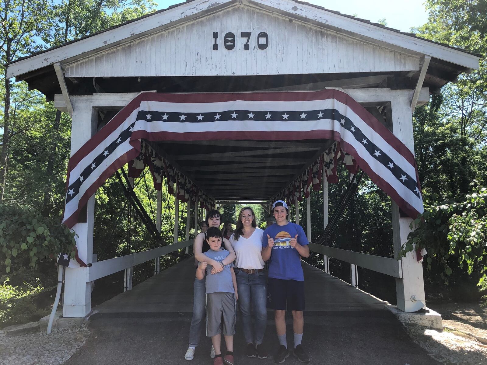 Sarah Greathouse with her children, Harrison, McKelvey and Gus.