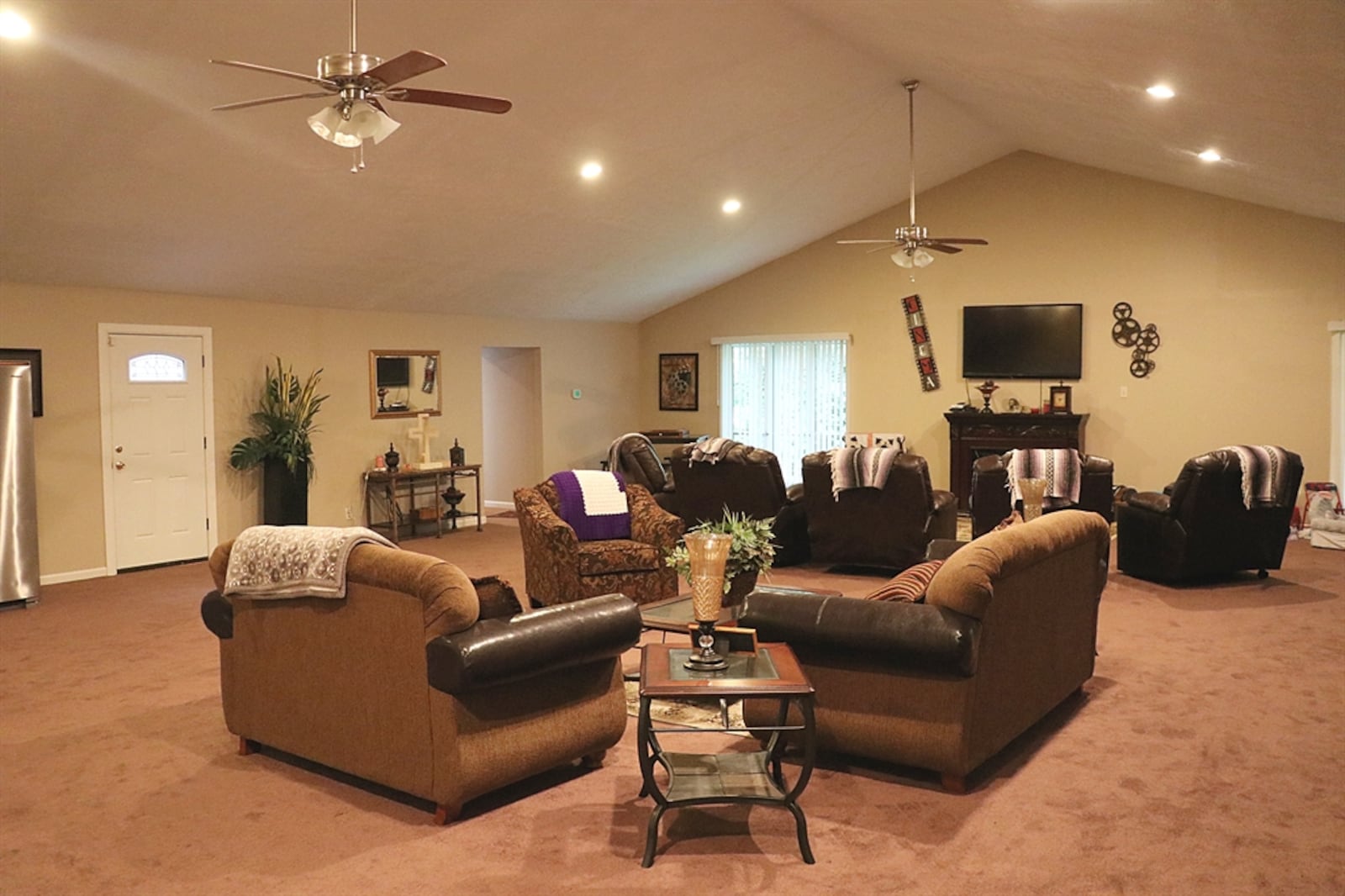 The 2,000-square-foot family room features several windows that look out over the wooded property. Contributed by Kathy Tyler