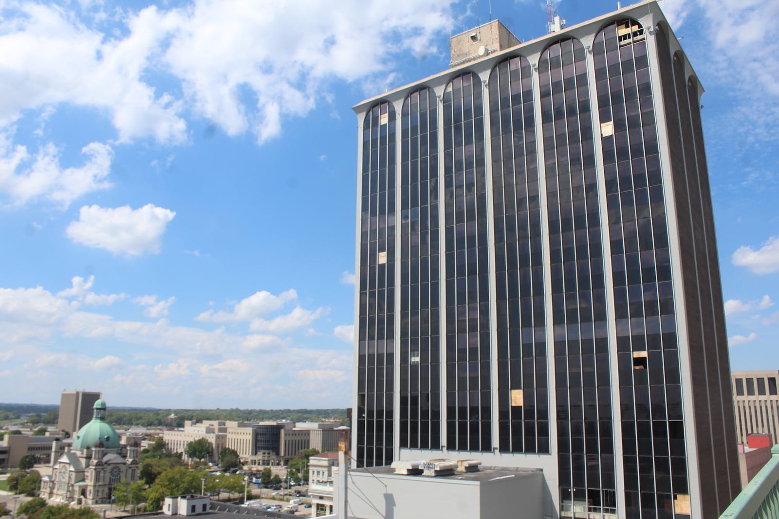 The Grant Deneau Tower on West Fourth Street in downtown Dayton. Developer Windsor Companies plans to convert the office tower into about 150 new apartments and office, retail and restaurant space. CORNELIUS FROLIK / STAFF