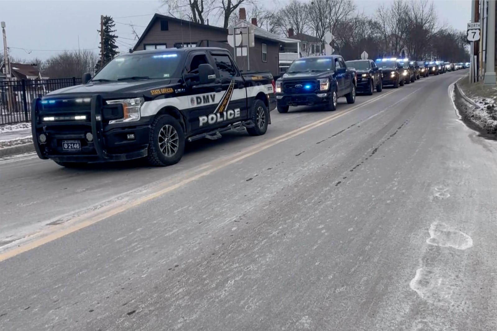 Law enforcement follow a hearse carrying fallen border patrol agent David Maland from the UVM Medical Center morgue to a funeral home in Burlington, Vt., Thursday, Jan. 23, 2025. (WCAX via AP)