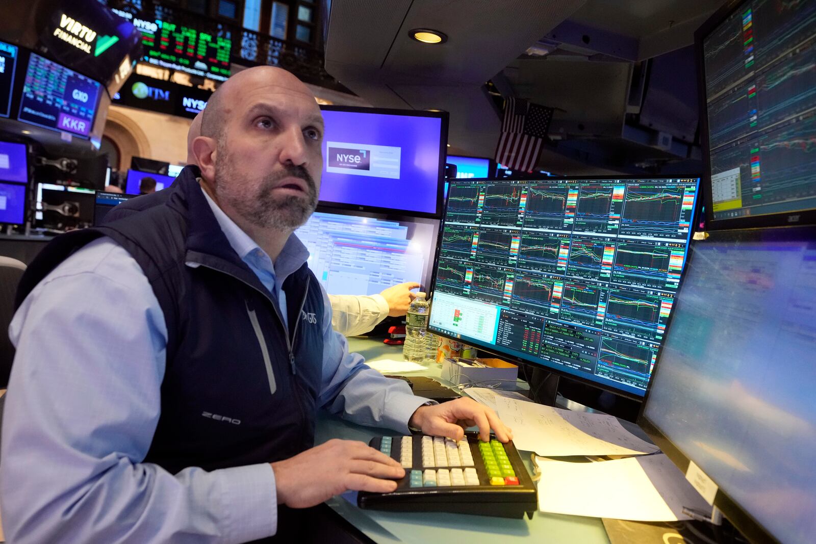 Specialist James Denaro works on the floor of the New York Stock Exchange, Tuesday, Feb. 4, 2025. (AP Photo/Richard Drew)