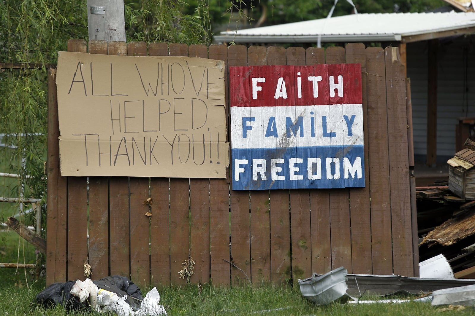 A sign along Woodhaven Avenue in Harrison Twp. after the Memorial Day tornadoes thanks the thousands of volunteers who helped in the recovery effort. TY GREENLEES / STAFF