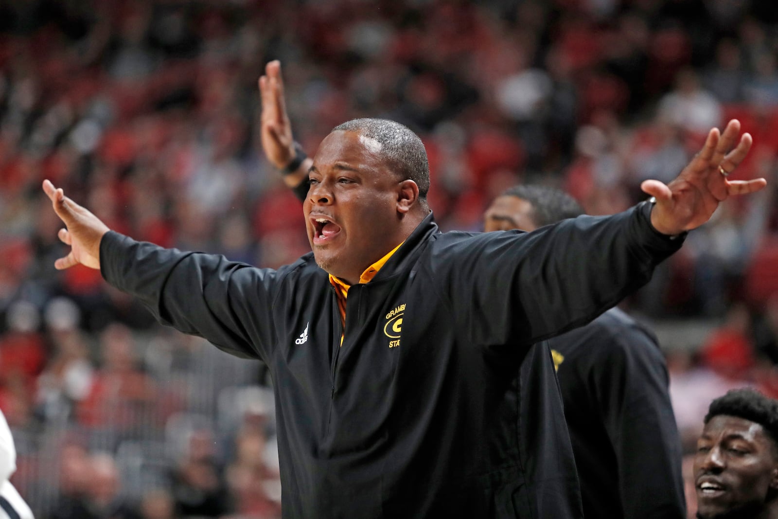 Grambling State coach Donte' Jackson yells out to his players during the first half of an NCAA college basketball game against Grambling State, Friday, Nov. 12, 2021, in Lubbock, Texas.  (Brad Tollefson/Lubbock Avalanche-Journal via AP)