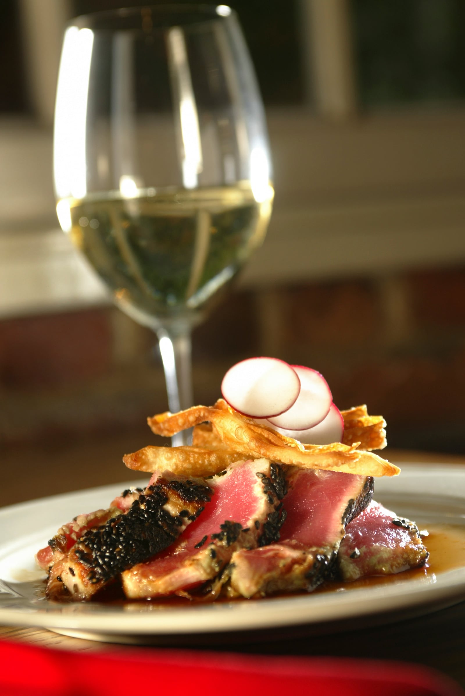 Seared Tuna appetizer, with white wine at jay's Seafood, 225 E. Sixth St. Photo by Jim Witmer