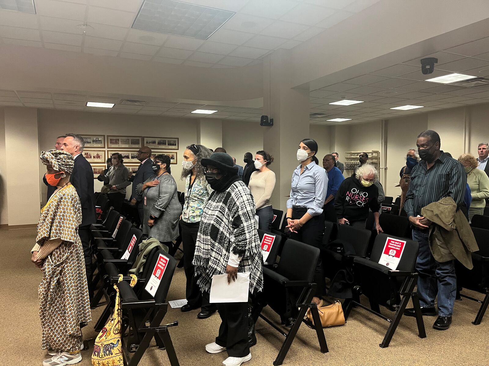 Many Dayton employees and visitors wore masks at Wednesday's city commission meeting even though the city lifted the indoor mask requirement two days earlier. CORNELIUS FROLIK / STAFF